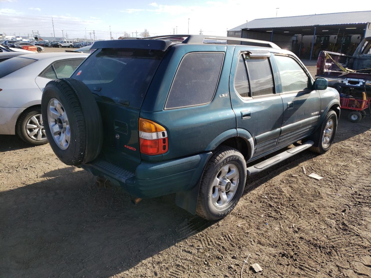 Photo 4 from auction – 1999 ISUZU RODEO S with VIN 4S2CM58W0X4326301