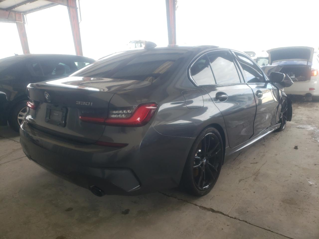 Photo 4 from auction – 2021 BMW 330I with VIN 3MW5R1J07M8B89805