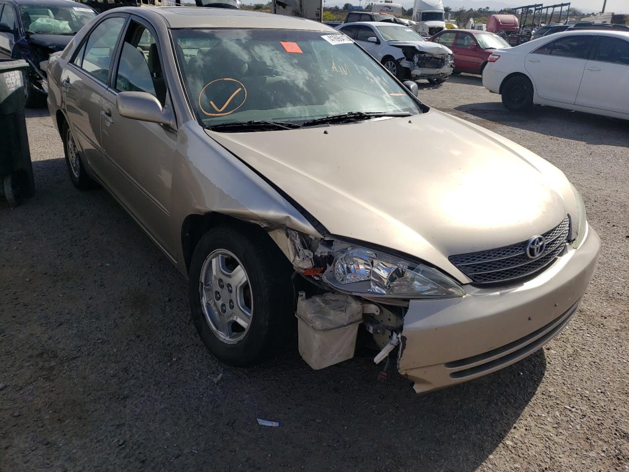 TOYOTA CAMRY LE 2002 with VIN 4T1BF30K12U018461 - Photo from auction