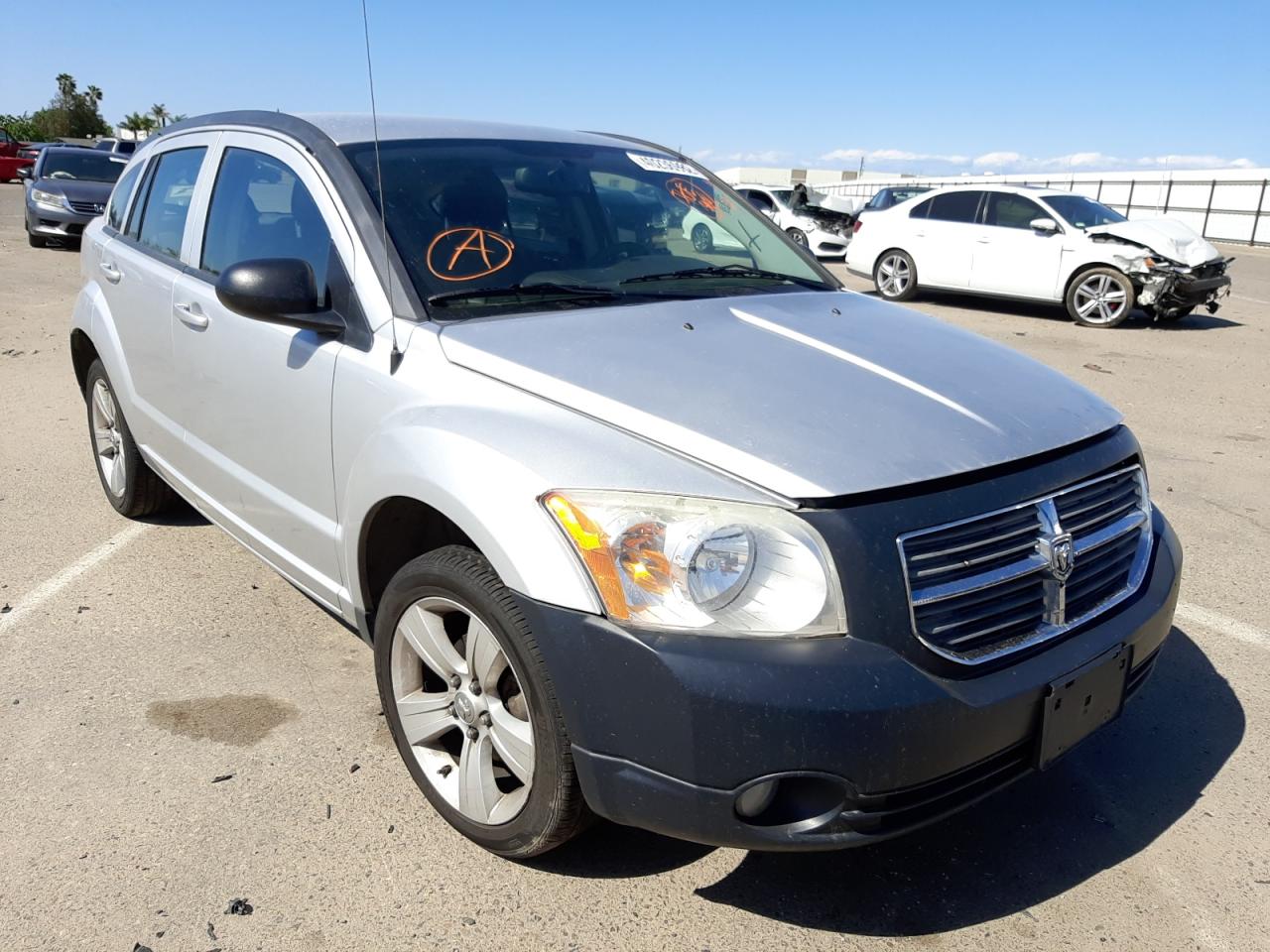 DODGE CALIBER MA 2011 with VIN 1B3CB3HA0BD242015 - Photo from auction