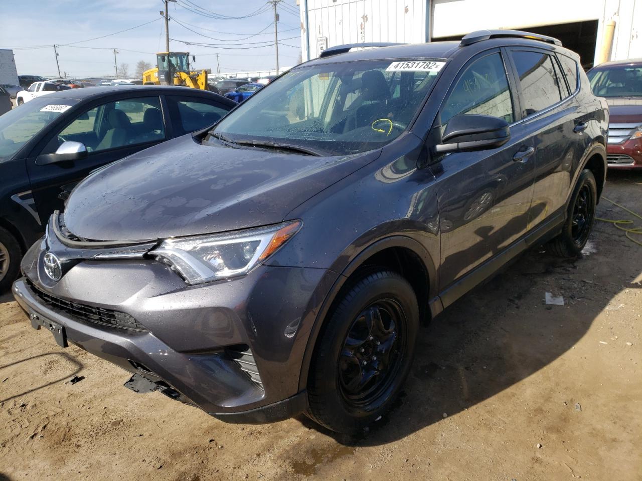 Photo 2 from auction – 2016 TOYOTA RAV4 LE with VIN JTMZFREV7GJ093733