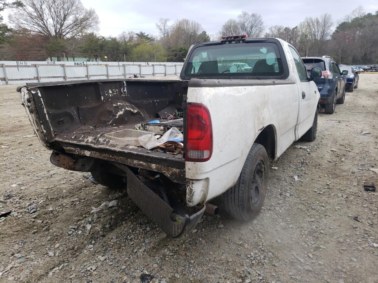 Photo 4 from auction – 2003 FORD F150 with VIN 1FTRF172X3NB03520