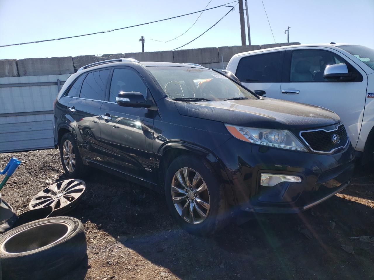 Photo 1 from auction – 2011 KIA SORENTO SX with VIN 5XYKWDA24BG097912