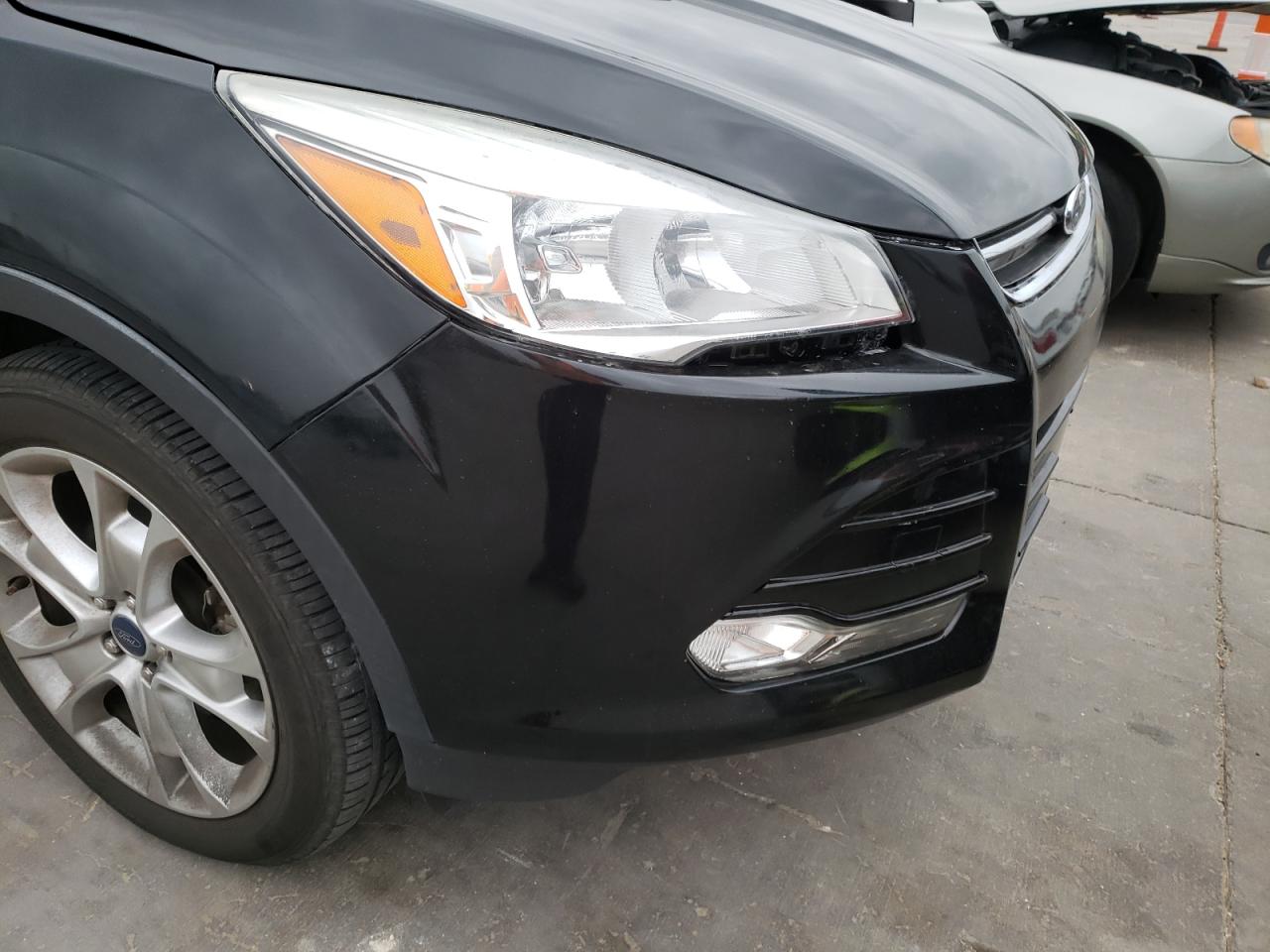 Photo 9 from auction – 2015 FORD ESCAPE TIT with VIN 1FMCU0J98FUC61209