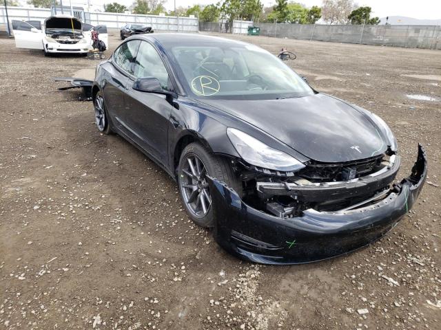 TESLA MODEL 3 2021 with VIN 5YJ3E1EB7MF877204 - Photo from auction