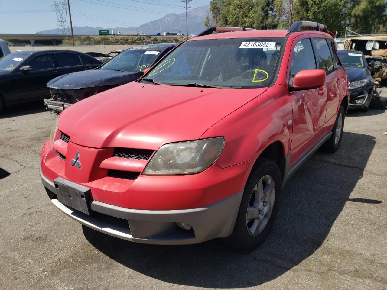 Photo 2 from auction – 2003 MITSUBISHI OUTLANDER with VIN JA4LX41G33U060728