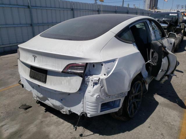 Photo 4 from auction – 2021 TESLA MODEL 3 with VIN 5YJ3E1EA5MF992505