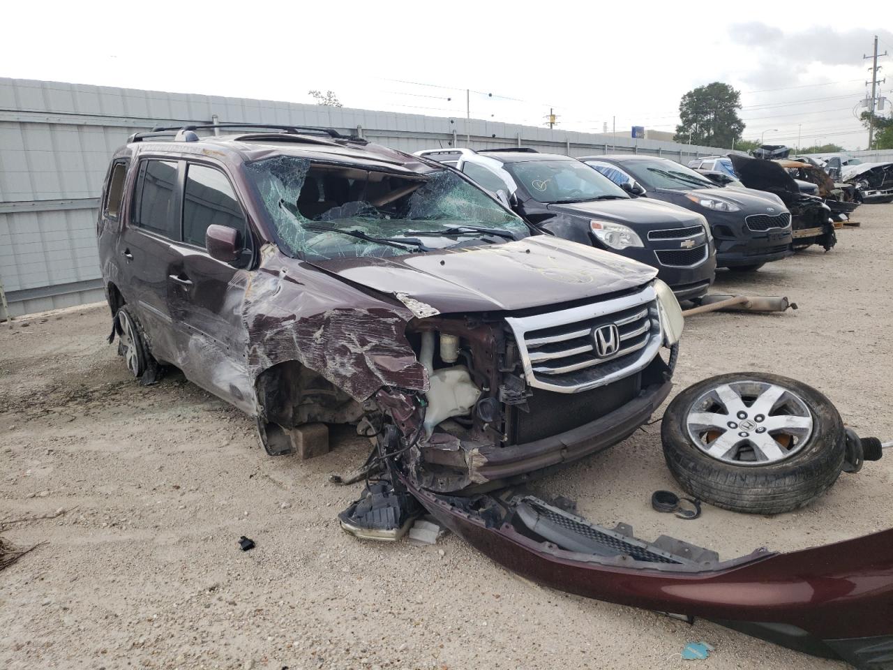 HONDA PILOT TOUR 2012 with VIN 5FNYF3H93CB018634 - Photo from auction