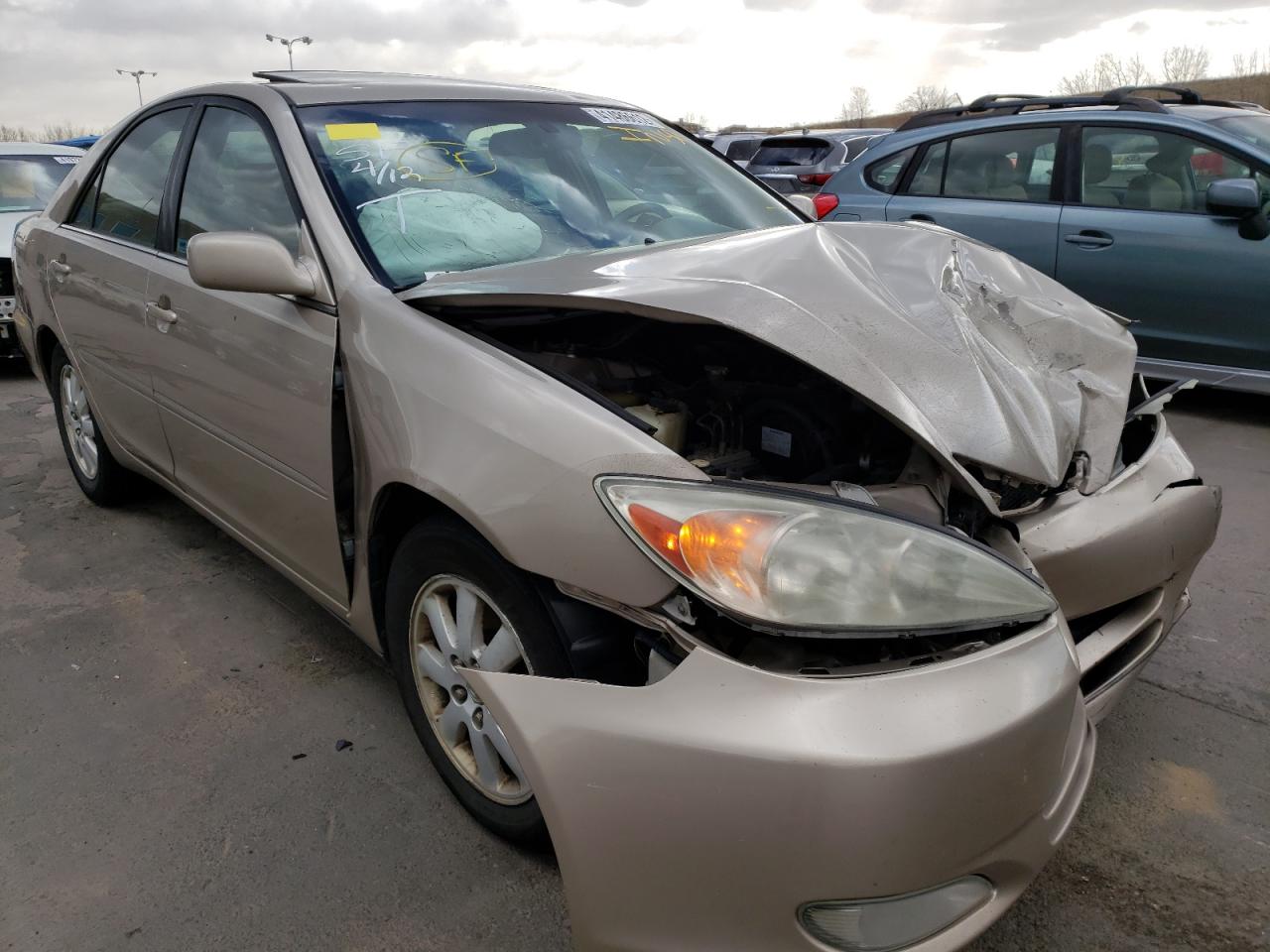 TOYOTA CAMRY LE 2003 with VIN 4T1BF30K13U550195 - Photo from auction