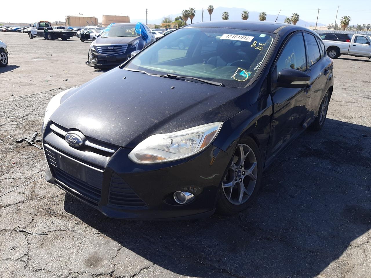 Photo 2 from auction – 2013 FORD FOCUS SE with VIN 1FADP3K24DL223410