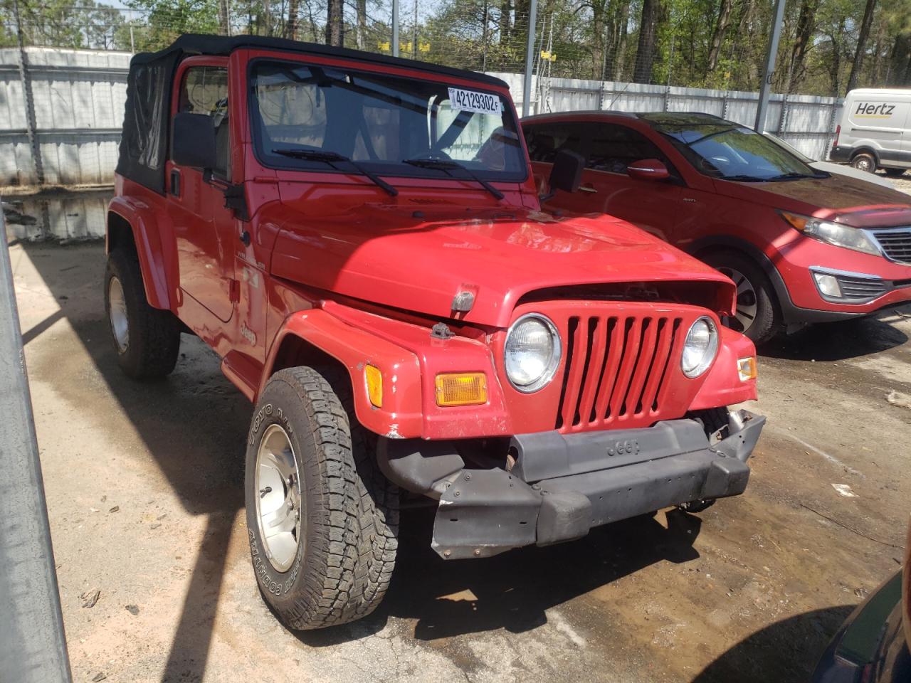 JEEP WRANGLER / 2002 with VIN 1J4FA39S32P740613 - Photo from auction