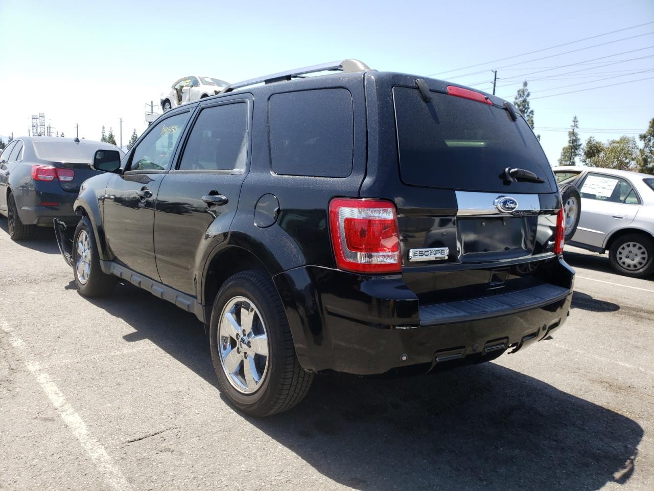 Photo 3 from auction – 2010 FORD ESCAPE LIM with VIN 1FMCU0EG2AKD46401