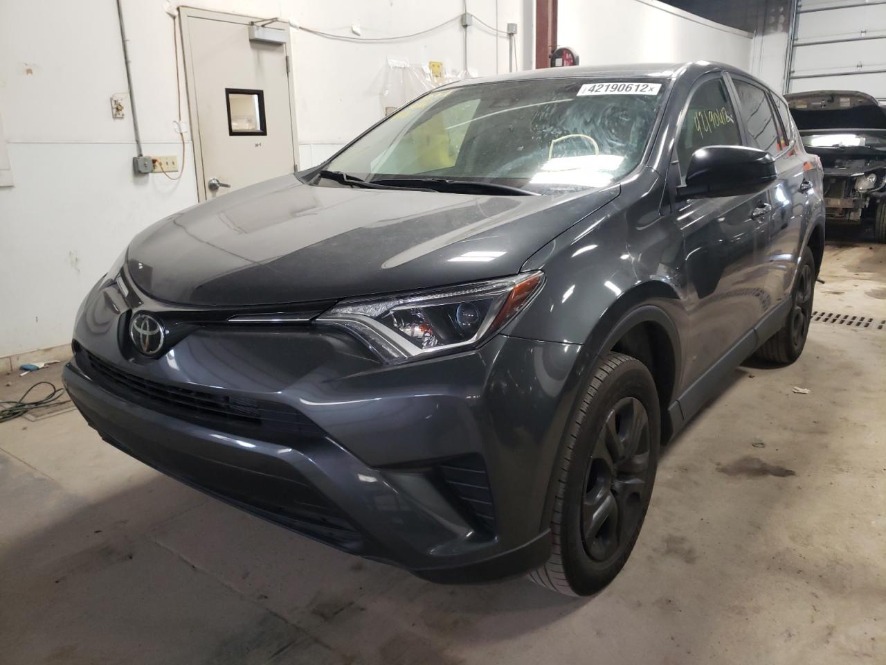 Photo 2 from auction – 2018 TOYOTA RAV4 LE with VIN 2T3BFREV4JW783224