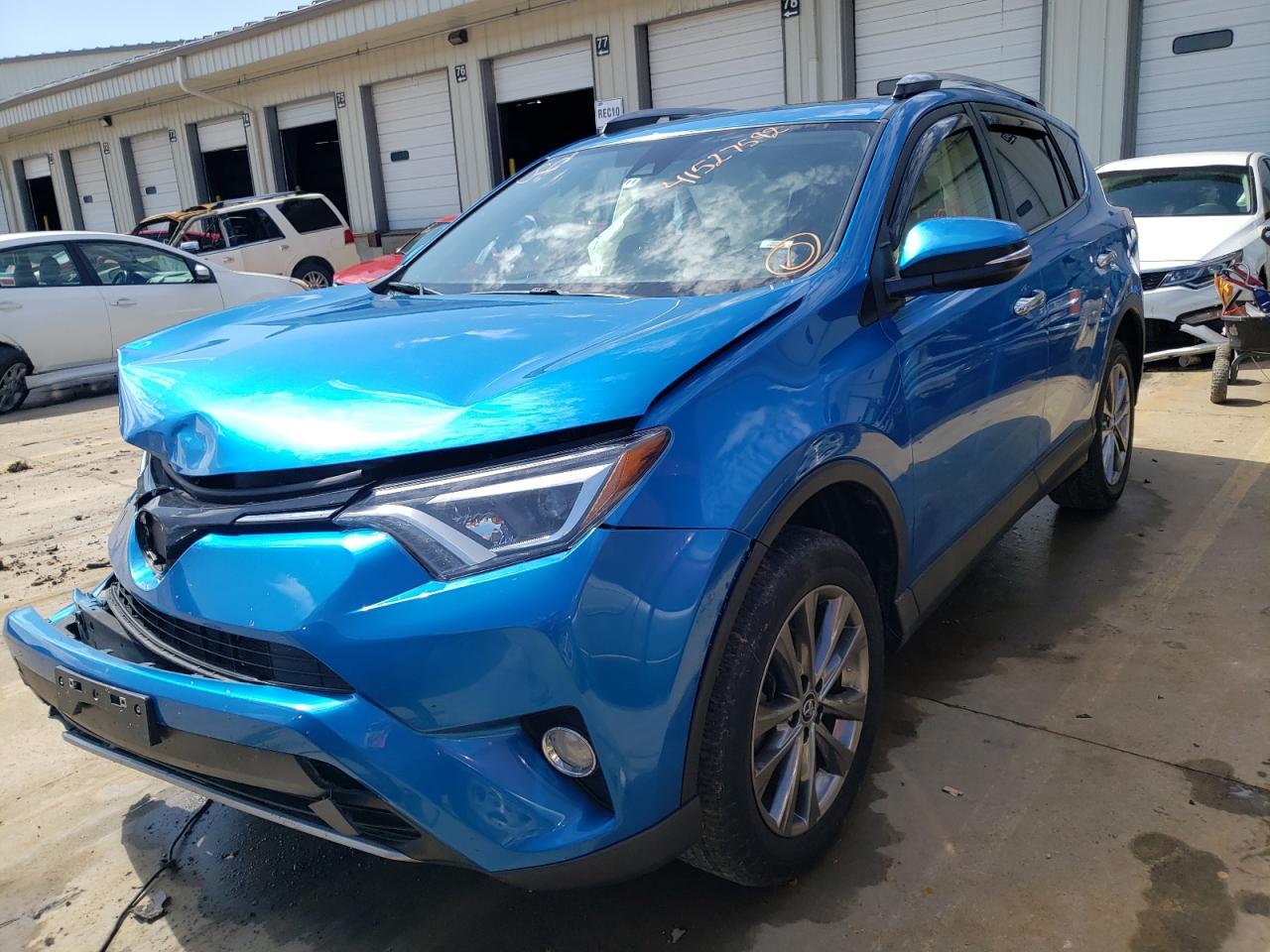 Photo 2 from auction – 2018 TOYOTA RAV4 LIMIT with VIN JTMYFREV4JJ156967