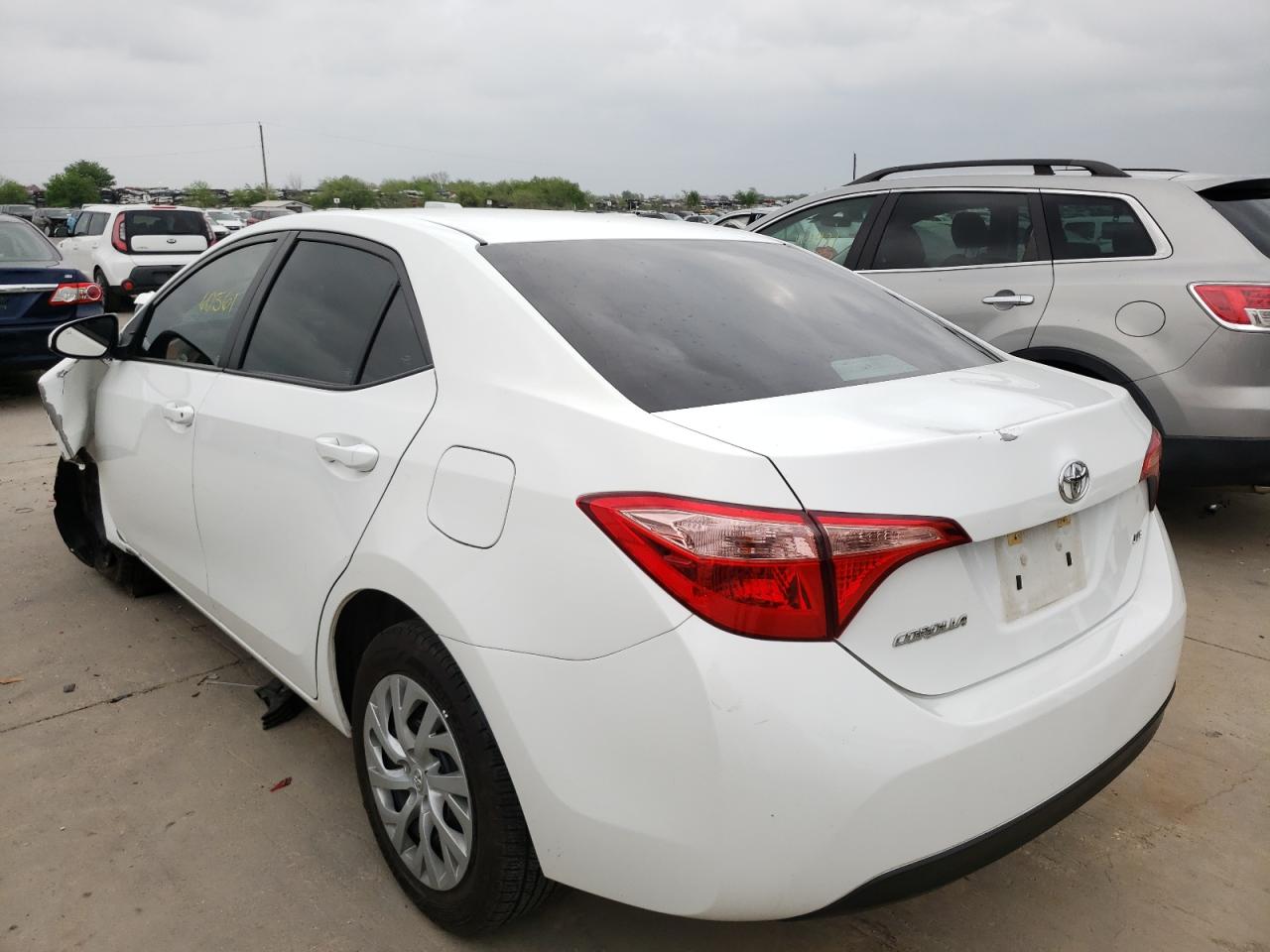 Photo 3 from auction – 2017 TOYOTA COROLLA L with VIN 5YFBURHE7HP576252