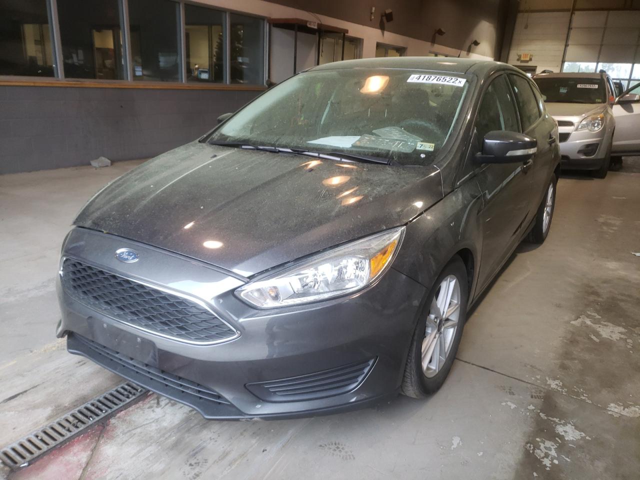 Photo 2 from auction – 2016 FORD FOCUS SE with VIN 1FADP3K23GL357328