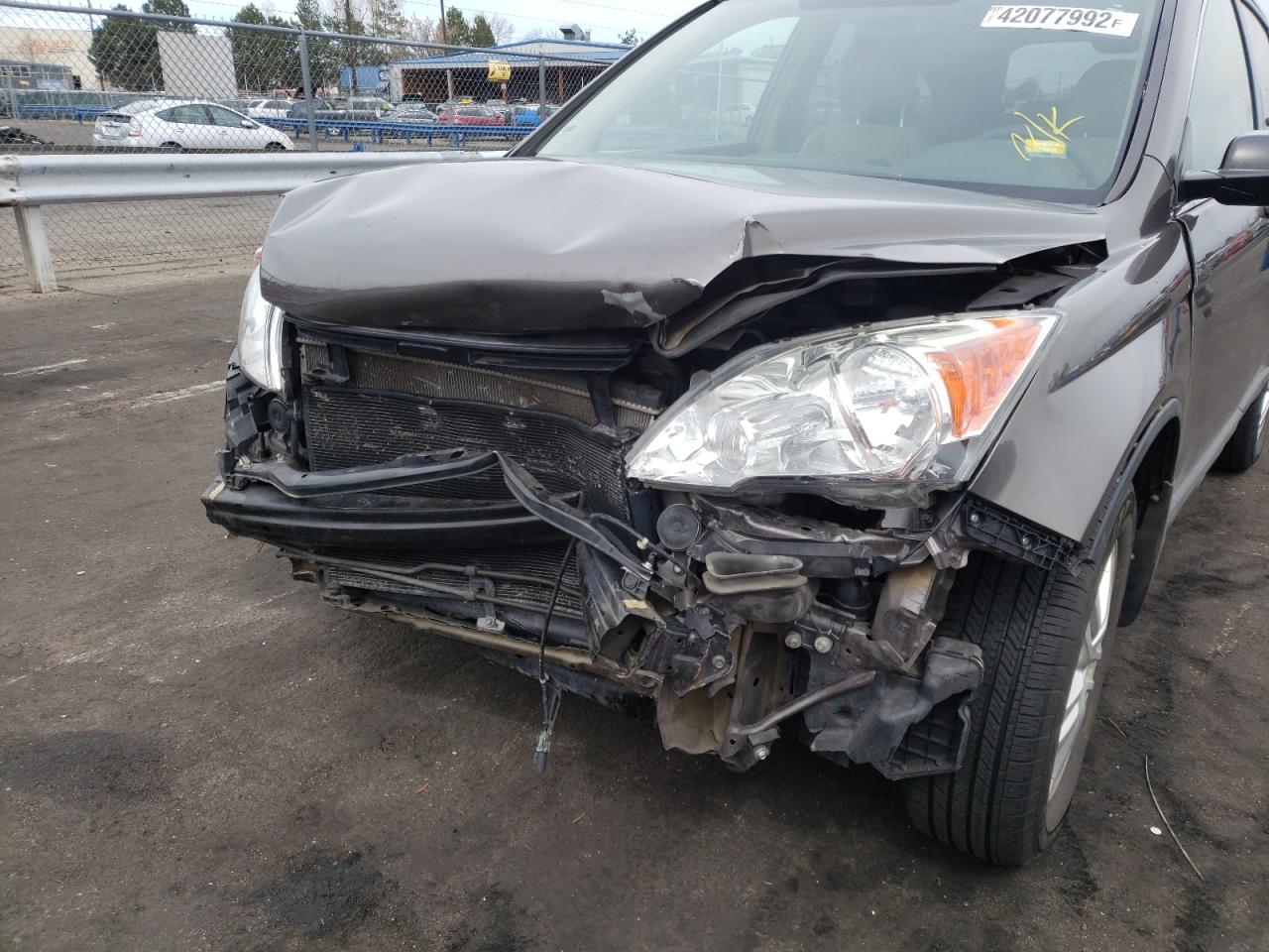 Photo 9 from auction – 2011 HONDA CR-V EX with VIN 5J6RE4H56BL018014