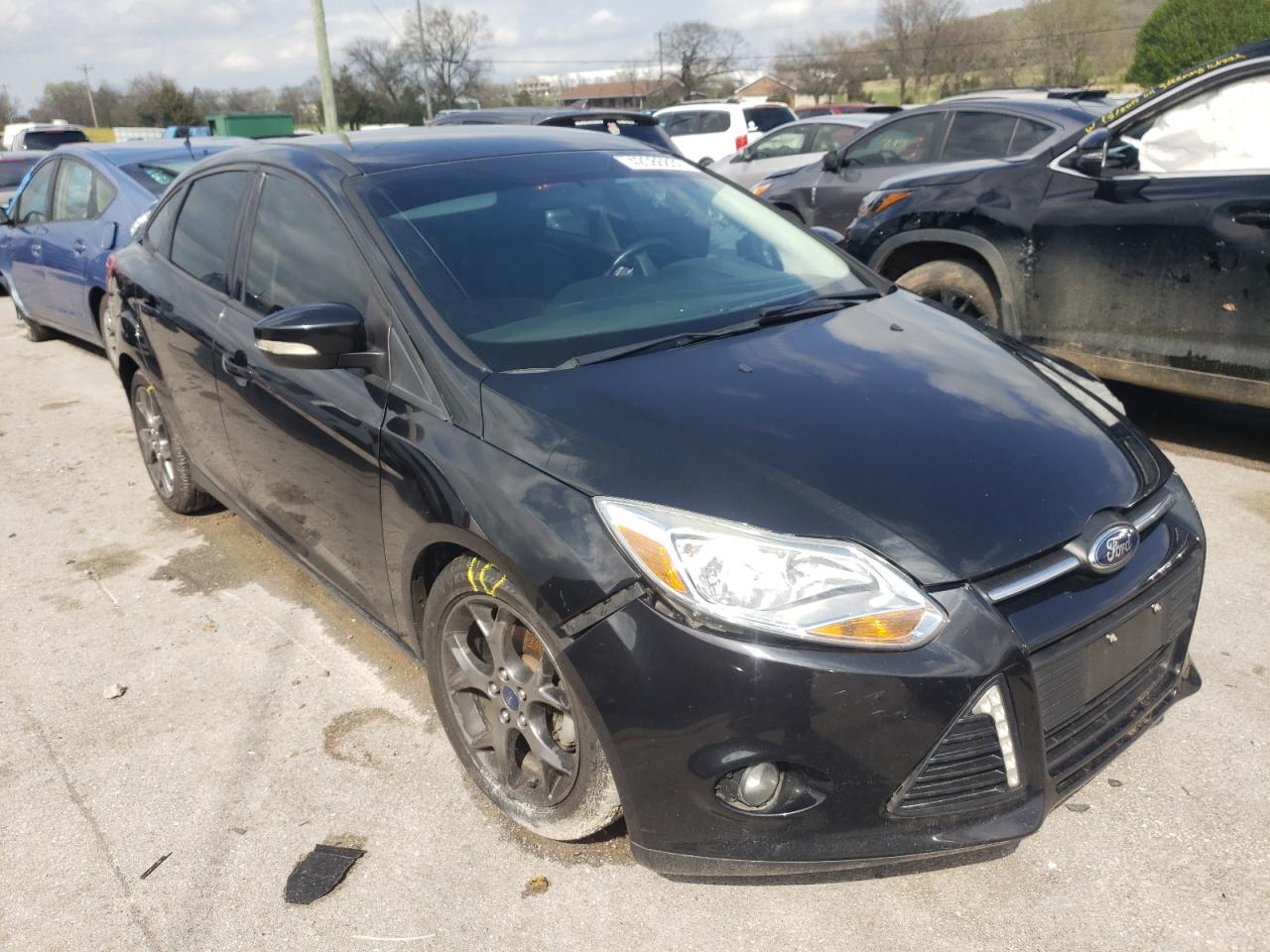 FORD FOCUS SE 2014 with VIN 1FADP3F27EL233408 - Photo from auction