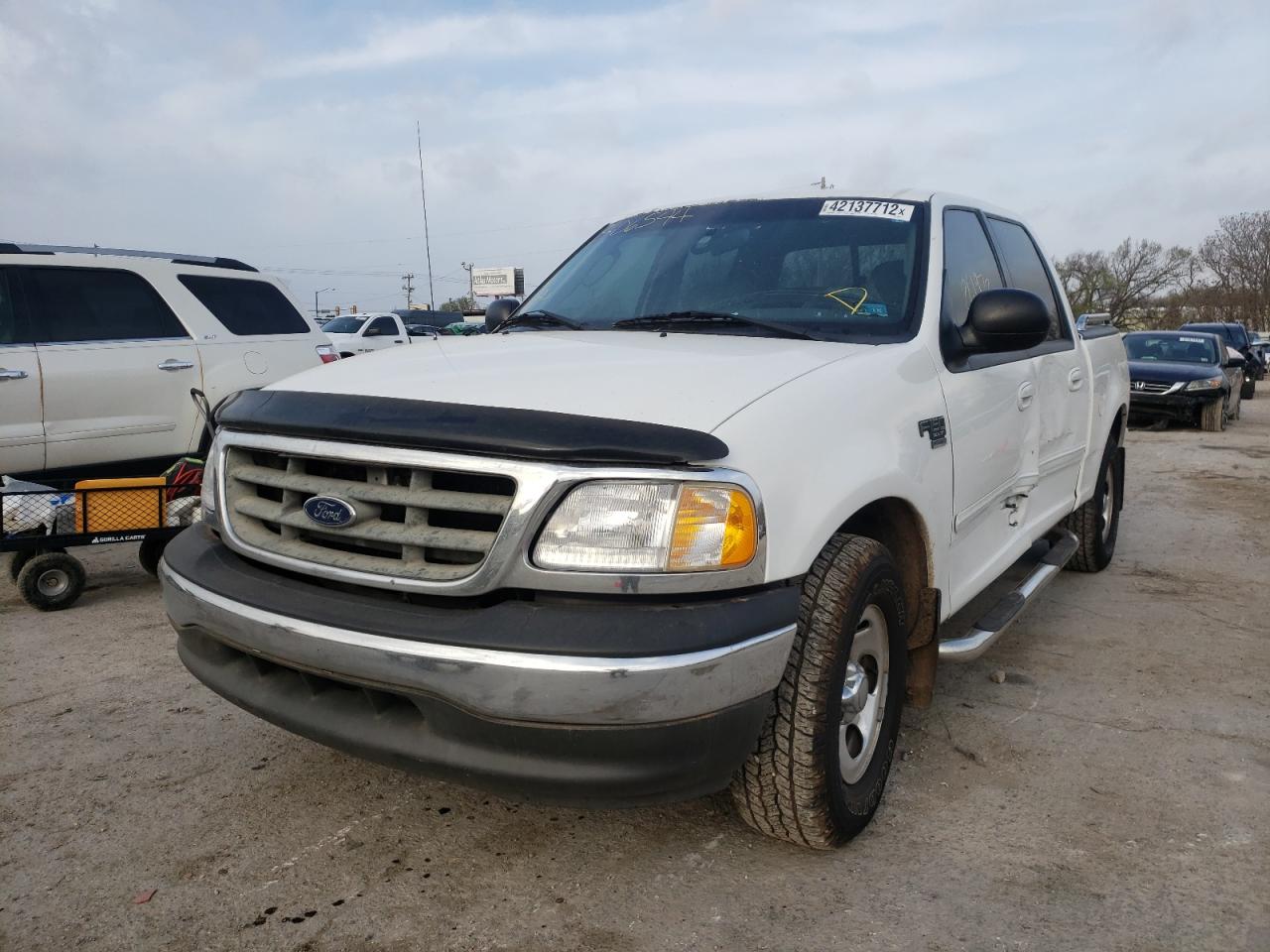 Photo 2 from auction – 2003 FORD F150 SUPER with VIN 1FTRW07683KB06544