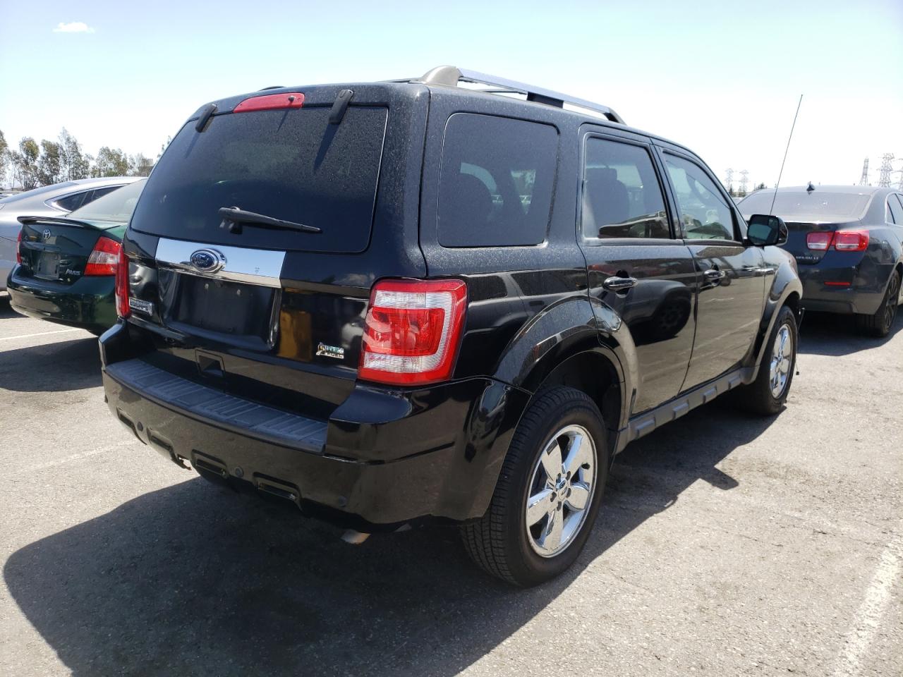 Photo 4 from auction – 2010 FORD ESCAPE LIM with VIN 1FMCU0EG2AKD46401