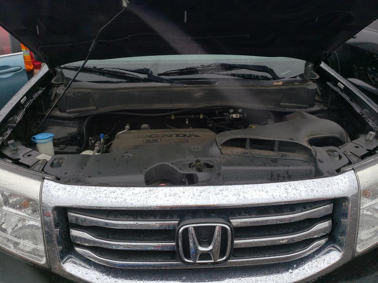 Photo 7 from auction – 2014 HONDA PILOT EXLN with VIN 5FNYF4H78EB043729