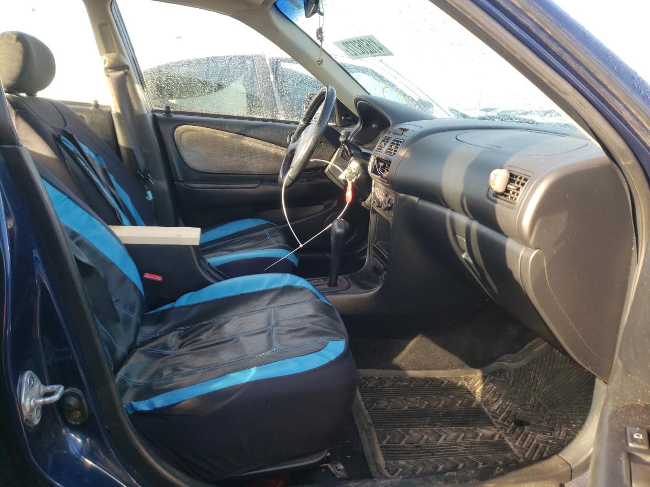 Photo 5 from auction – 2001 TOYOTA COROLLA CE with VIN 1NXBR12E31Z475452