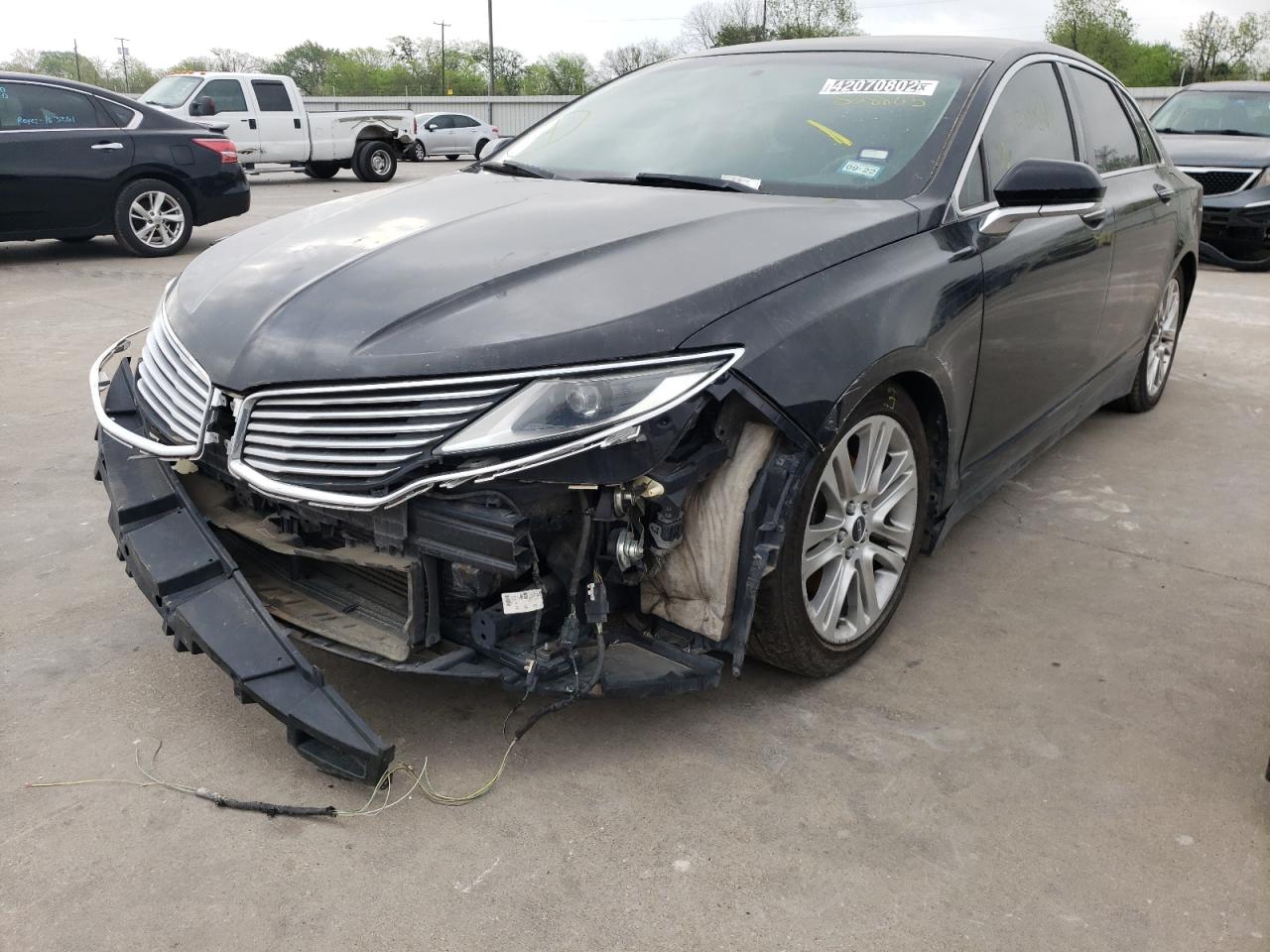 Foto 2 de la subasta – 2014 LINCOLN MKZ con VIN 3LN6L2G96ER828865
