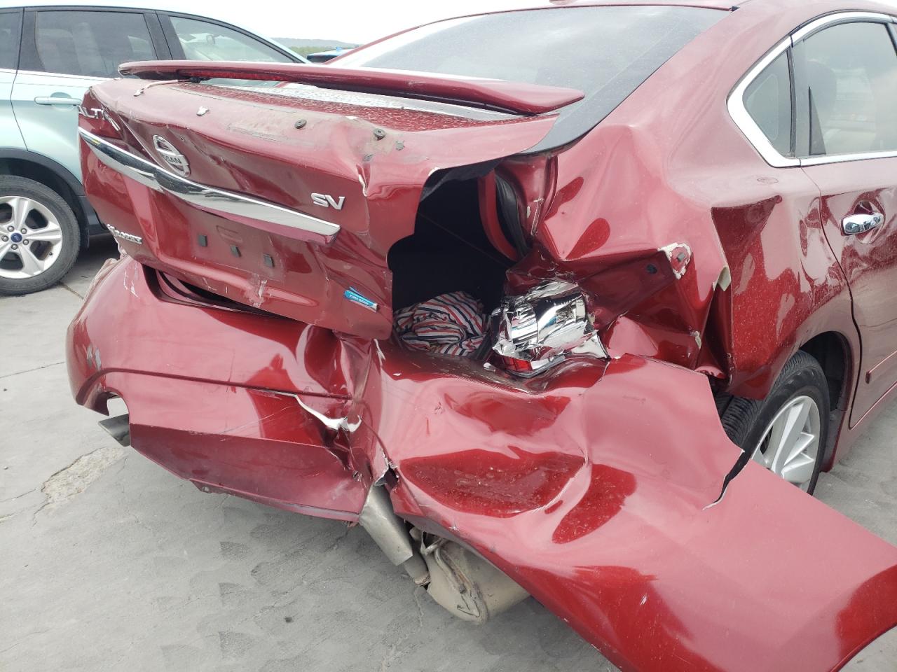 Photo 9 from auction – 2014 NISSAN ALTIMA 2.5 with VIN 1N4AL3AP2EN207191