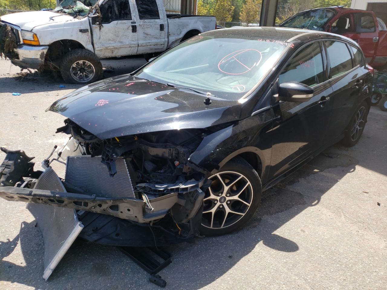 Photo 2 from auction – 2016 FORD FOCUS SE with VIN 1FADP3K25GL266013