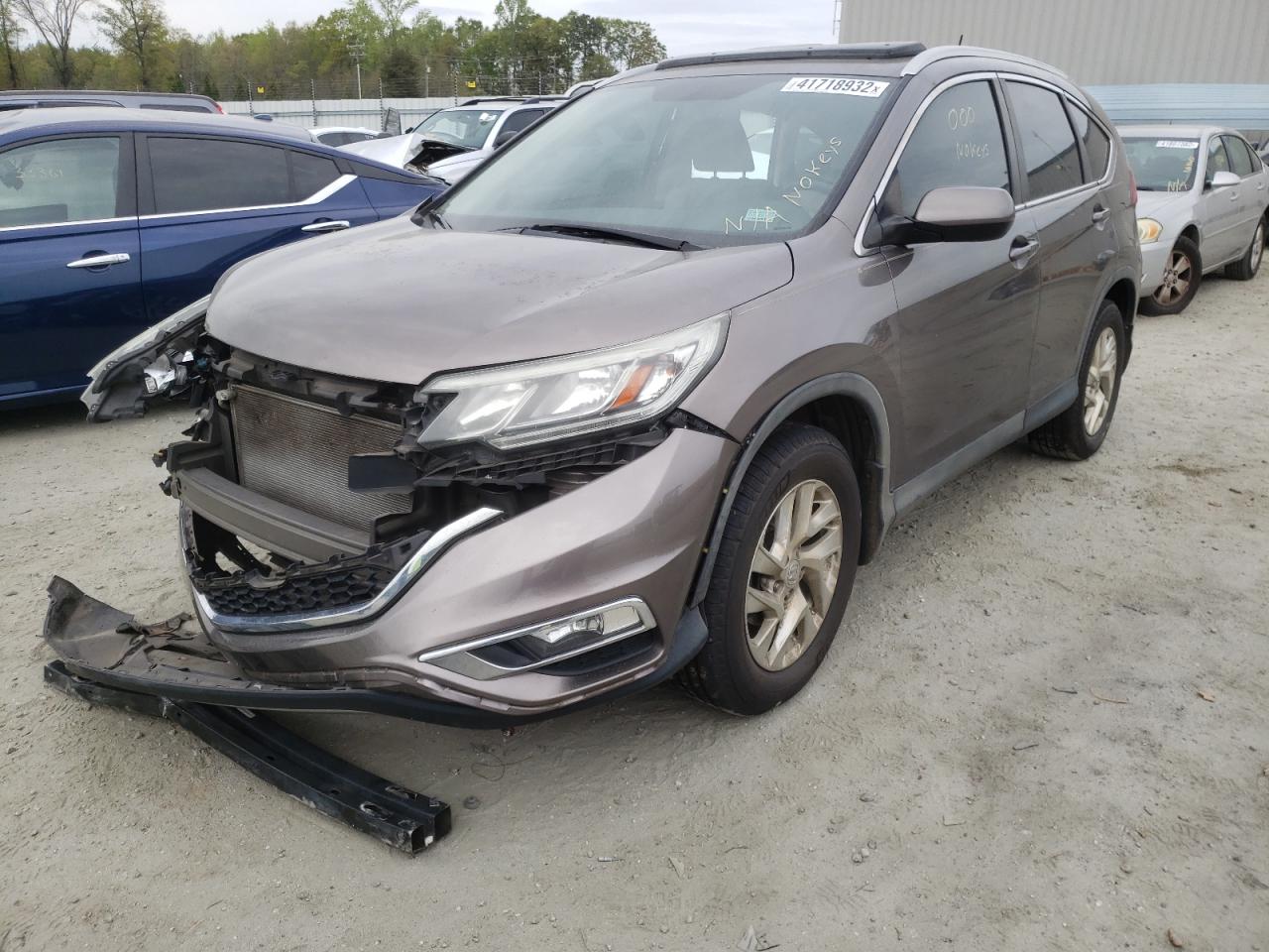 Photo 2 from auction – 2016 HONDA CR-V EXL with VIN 5J6RM4H70GL061825