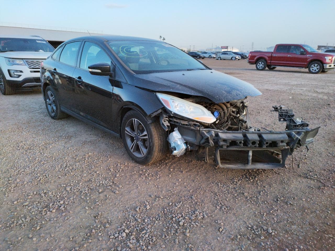 FORD FOCUS SE 2014 with VIN 1FADP3F2XEL389815 - Photo from auction