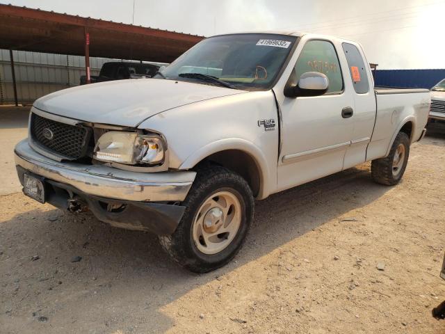 Photo 2 from auction – 2000 FORD F150 with VIN 1FTRX18LXYKA79412