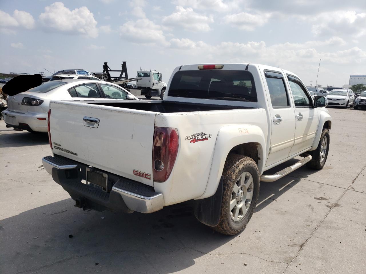 Photo 4 from auction – 2012 GMC CANYON SLE with VIN 1GTH6PFE6C8153419