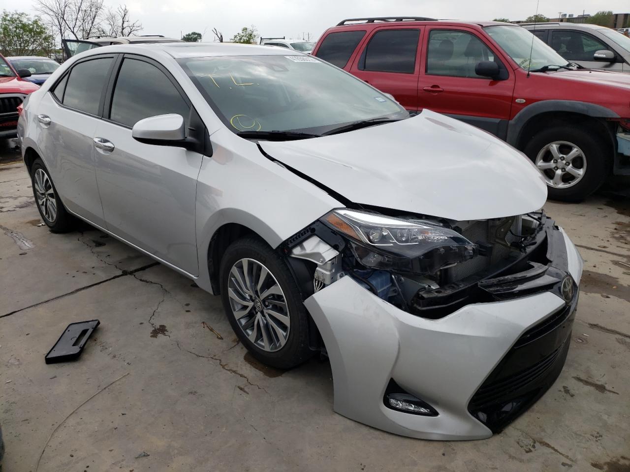 TOYOTA COROLLA L 2018 with VIN 5YFBURHEXJP807814 - Photo from auction