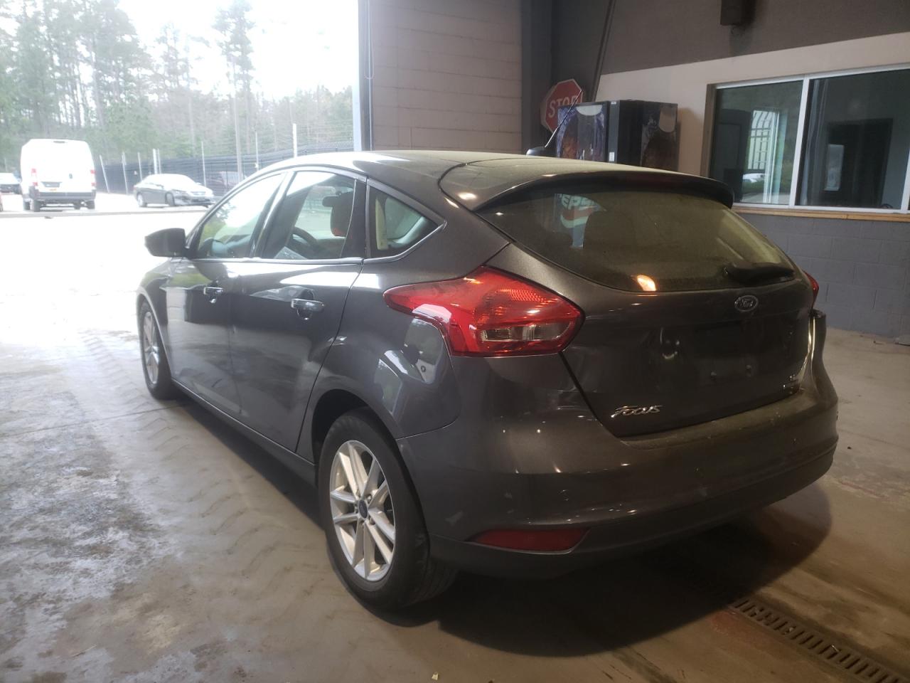 Photo 3 from auction – 2016 FORD FOCUS SE with VIN 1FADP3K23GL357328