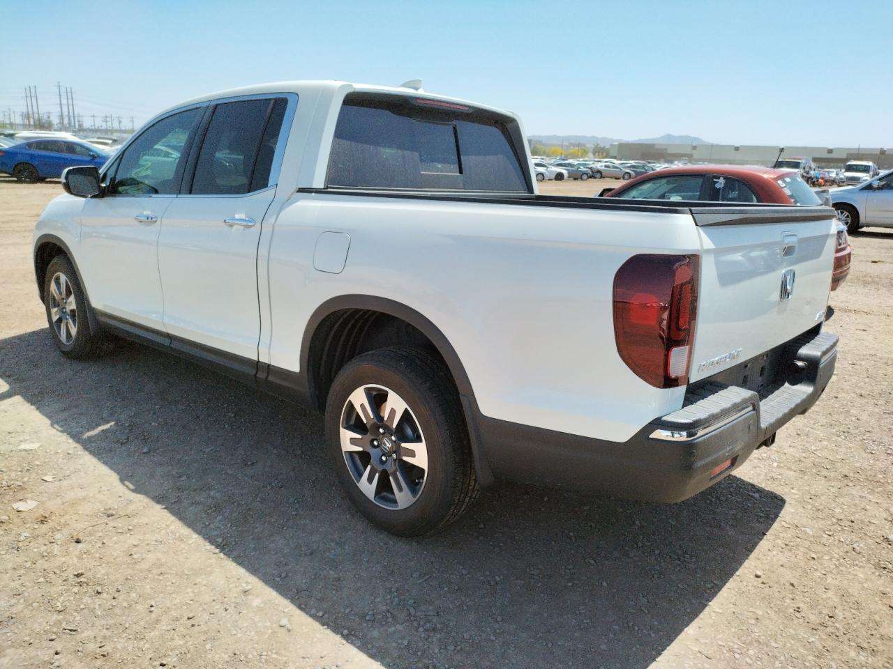 Photo 3 from auction – 2019 HONDA RIDGELINE with VIN 5FPYK3F73KB025540