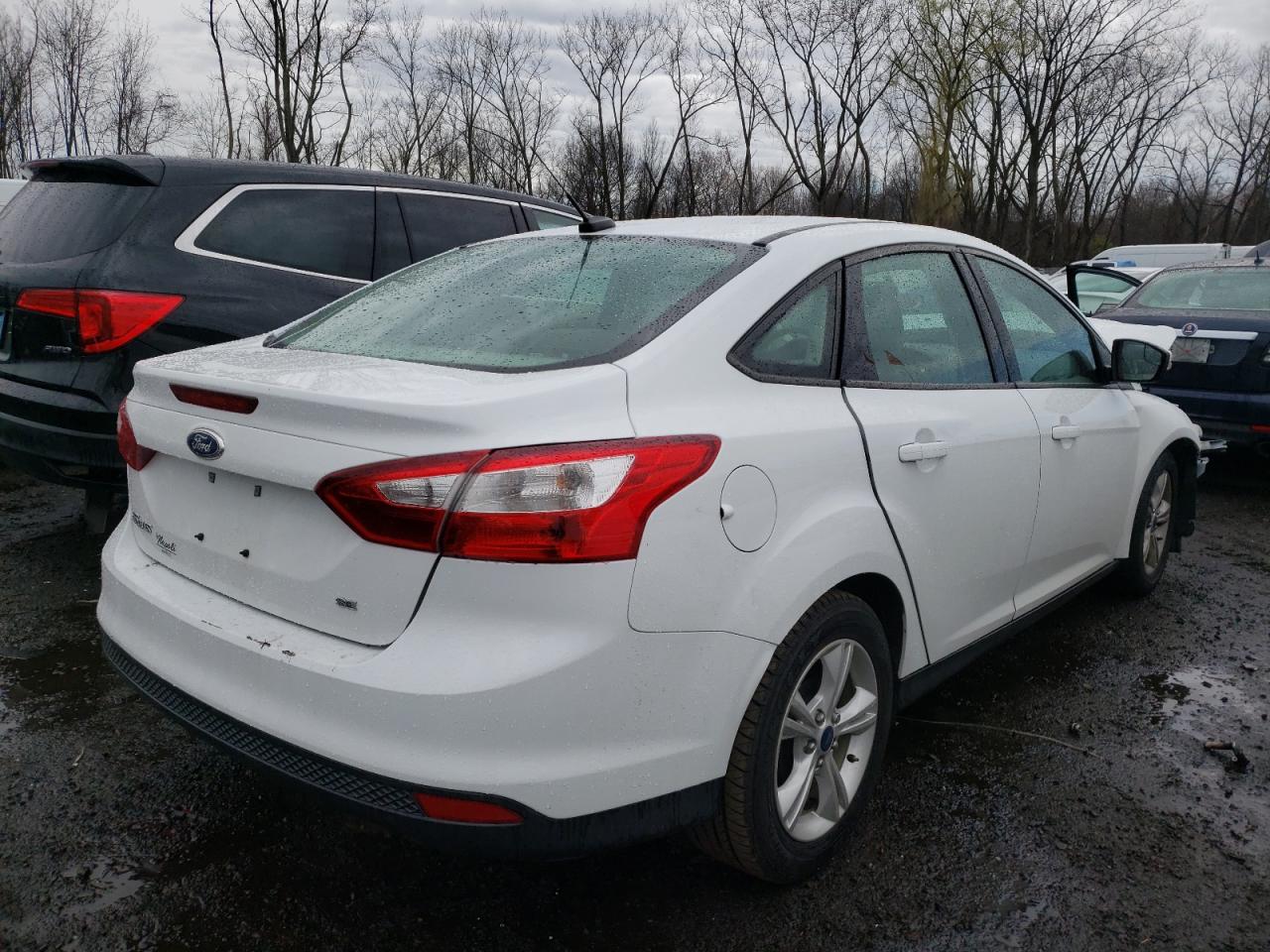 Photo 4 from auction – 2014 FORD FOCUS SE with VIN 1FADP3F21EL446483