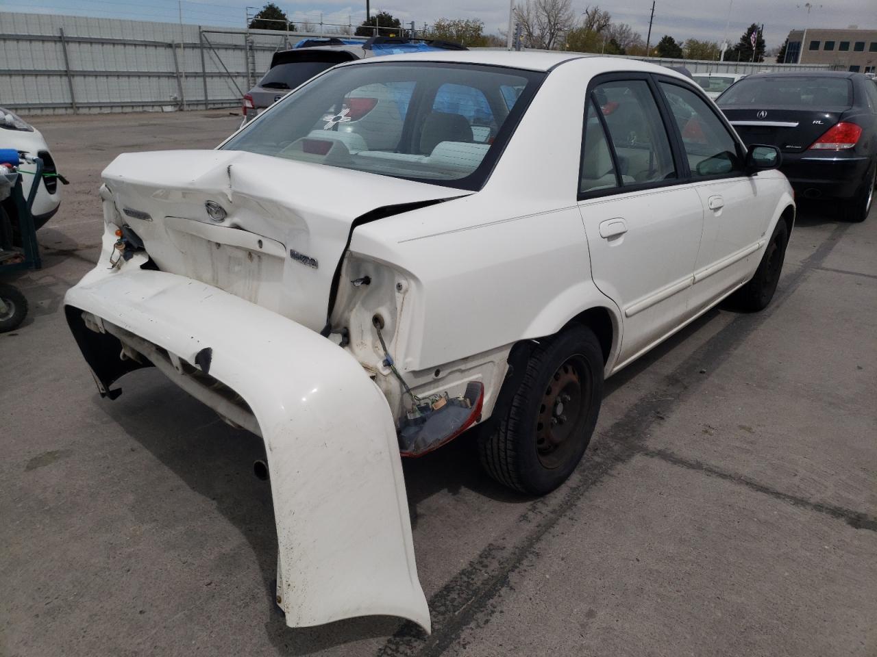 Photo 4 from auction – 1999 MAZDA PROTEGE DX with VIN JM1BJ2225X0153614