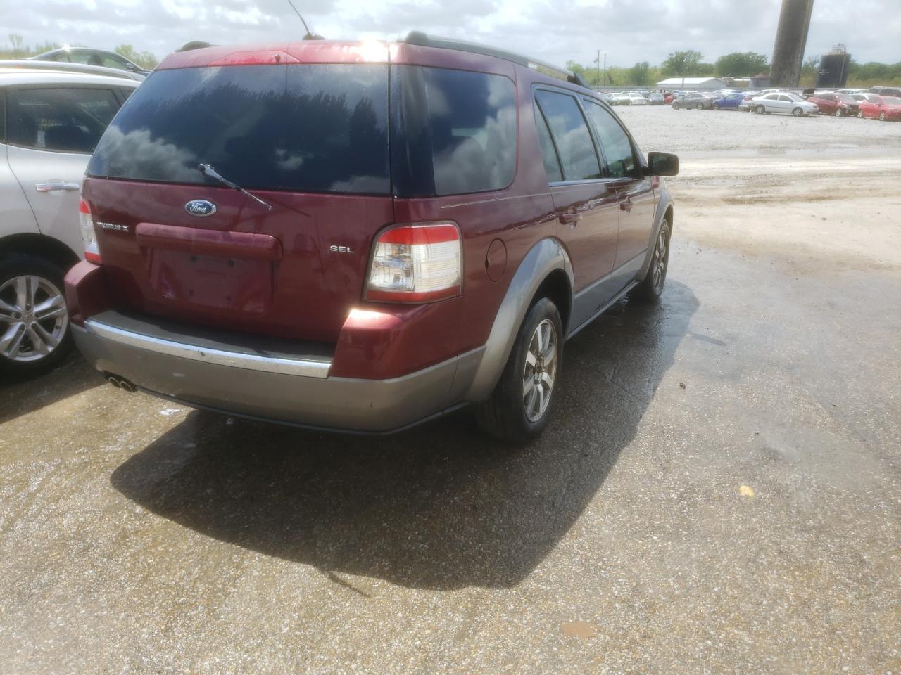 Photo 4 from auction – 2008 FORD TAURUS X S with VIN 1FMDK02WX8GA35947