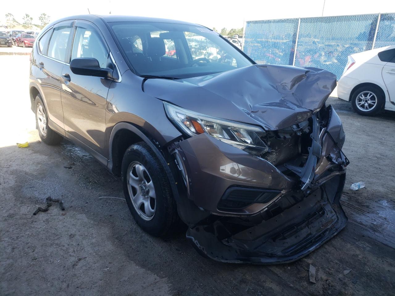 HONDA CR-V LX 2015 with VIN 3CZRM3H35FG703345 - Photo from auction
