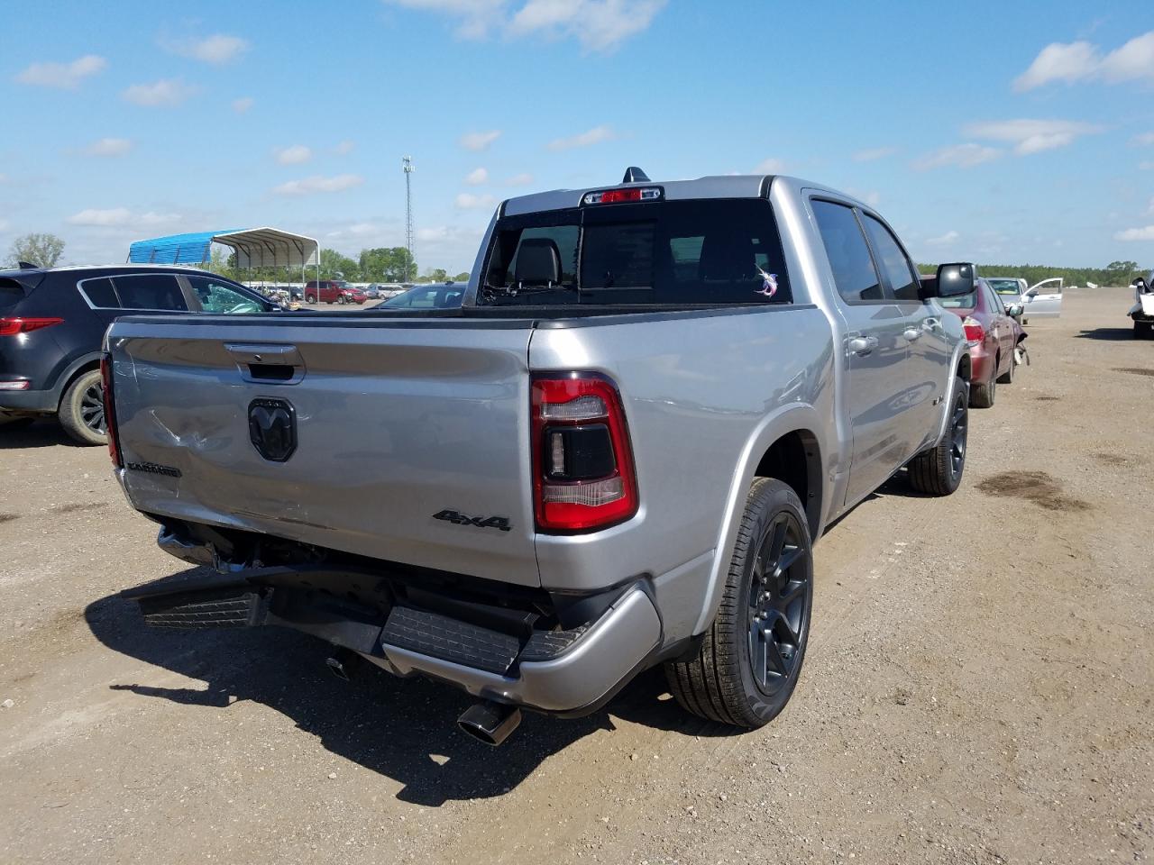 Photo 4 from auction – 2022 RAM 1500 LARAM with VIN 1C6SRFJTXNN238949