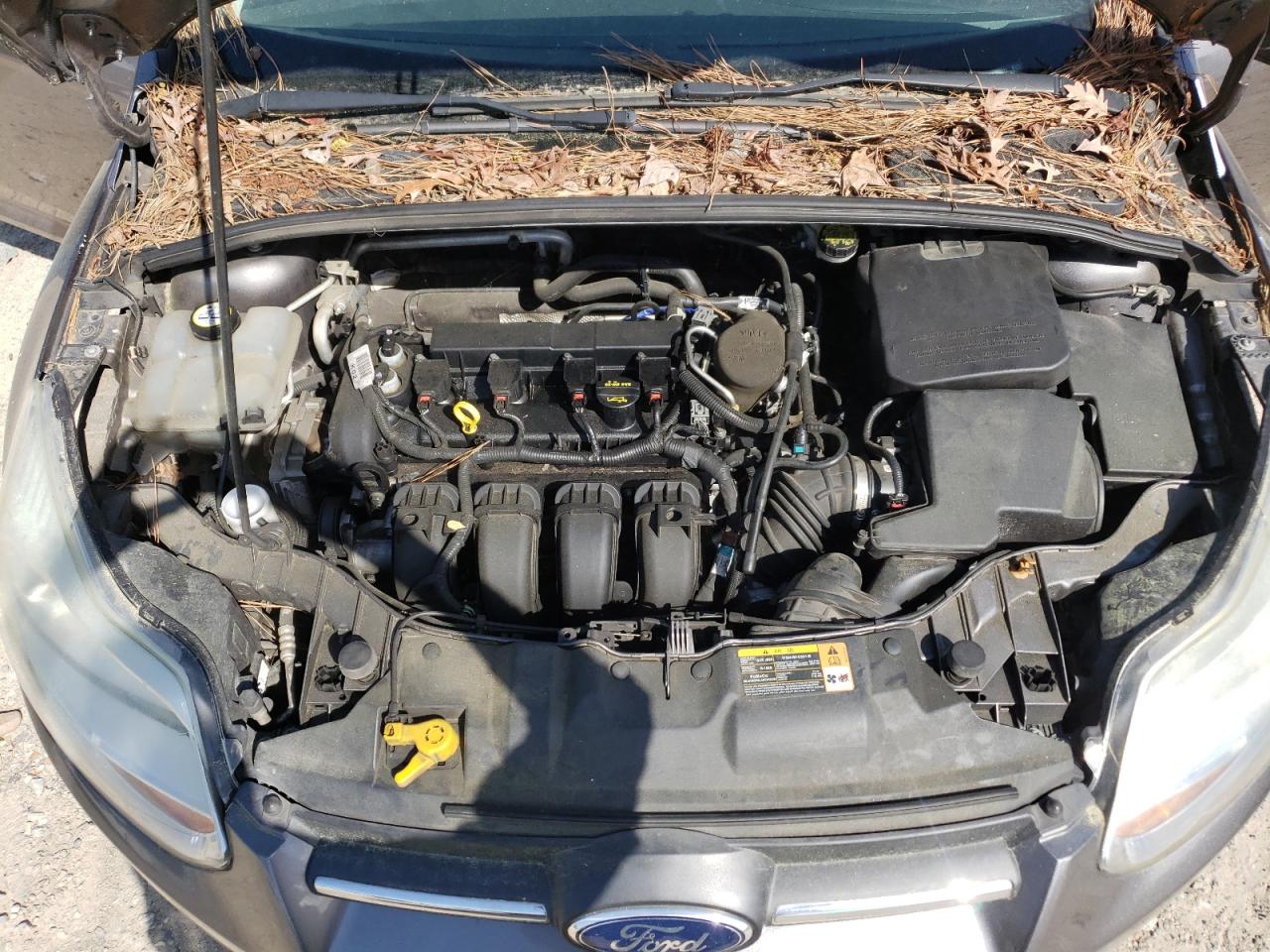 Photo 7 from auction – 2014 FORD FOCUS SE with VIN 1FADP3F26EL180877