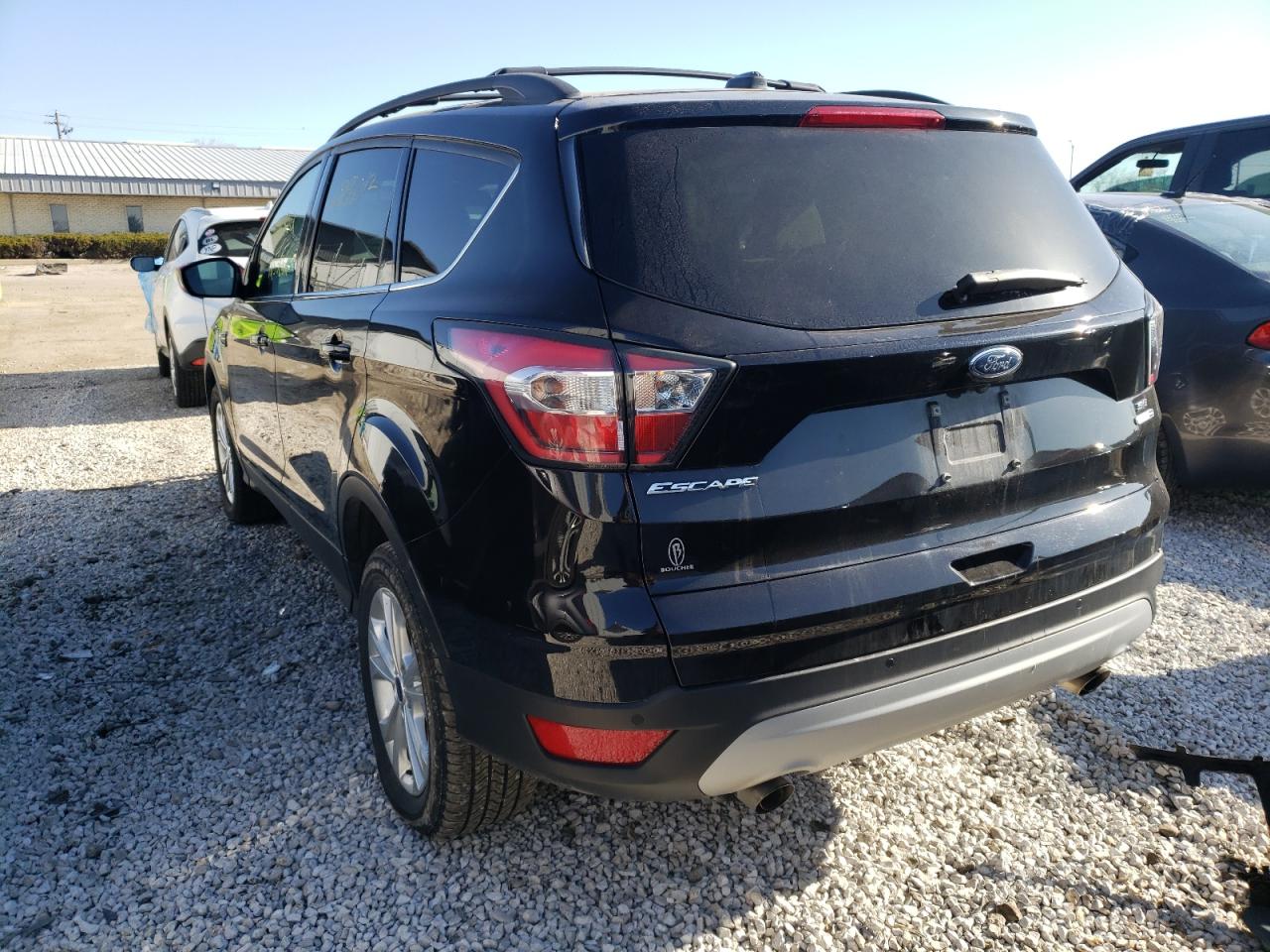 Photo 3 from auction – 2017 FORD ESCAPE SE with VIN 1FMCU9GD5HUA25068