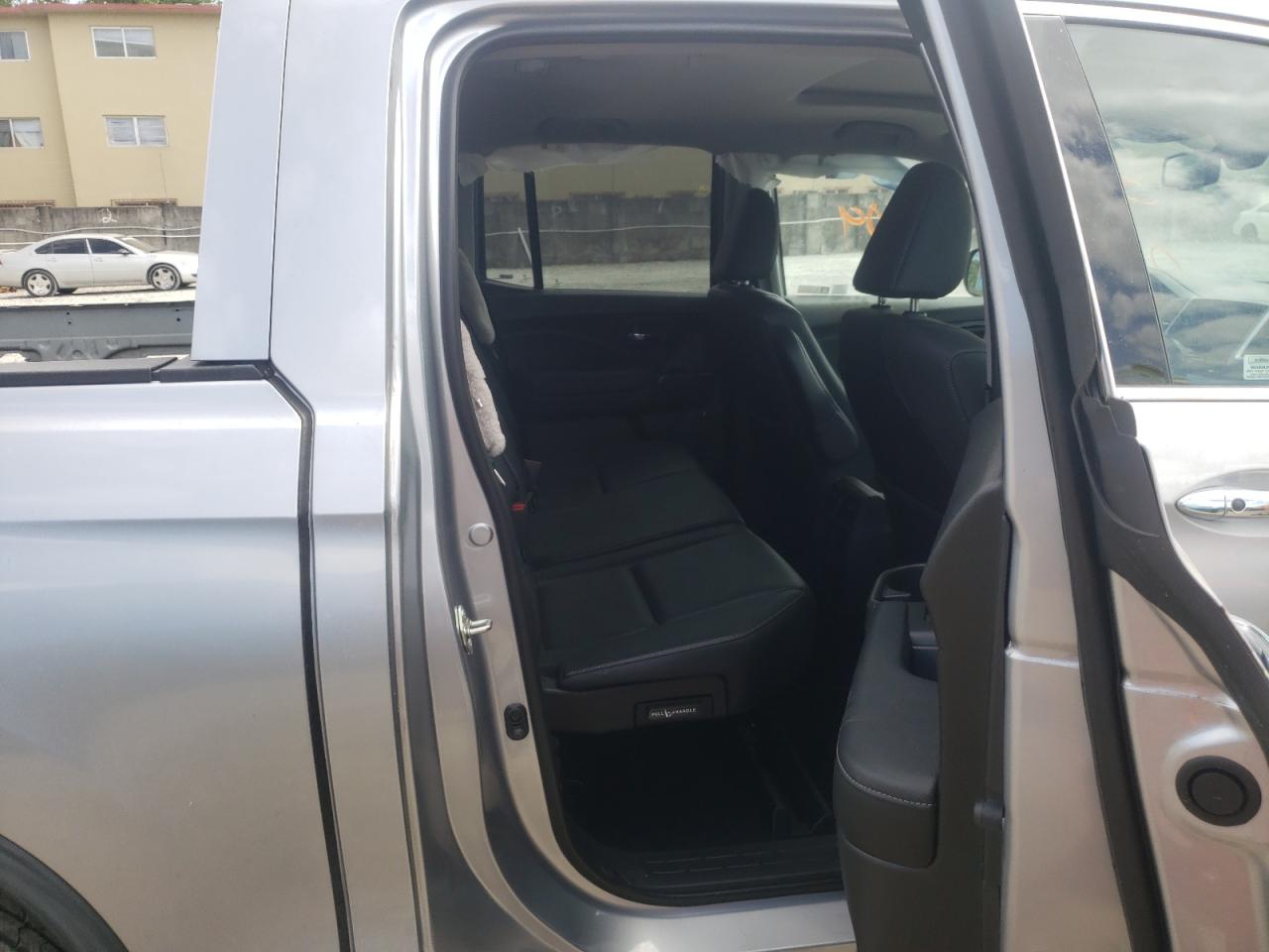 Photo 6 from auction – 2018 HONDA RIDGELINE with VIN 5FPYK3F77JB008609