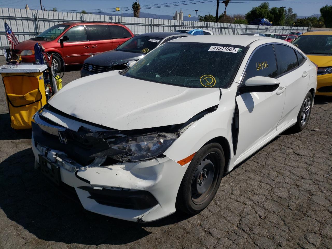 Photo 2 from auction – 2017 HONDA CIVIC LX with VIN 2HGFC2F5XHH565543