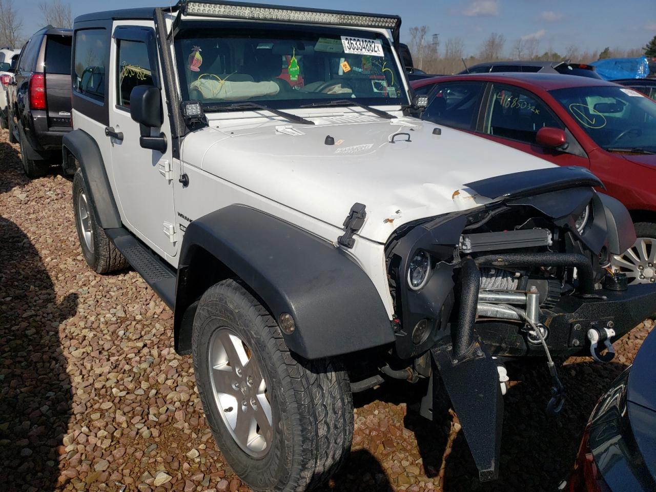 JEEP WRANGLER S 2013 with VIN 1C4AJWAG3DL634052 - Photo from auction