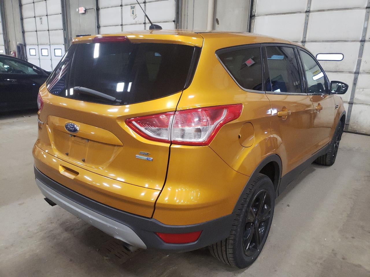 Photo 4 from auction – 2016 FORD ESCAPE SE with VIN 1FMCU9GX9GUC61182