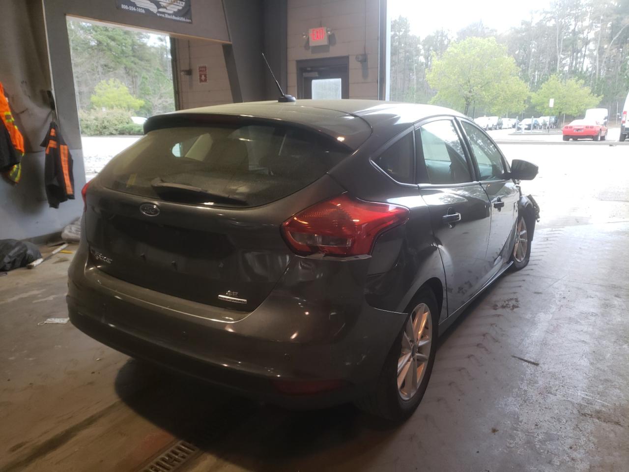 Photo 4 from auction – 2016 FORD FOCUS SE with VIN 1FADP3K23GL357328