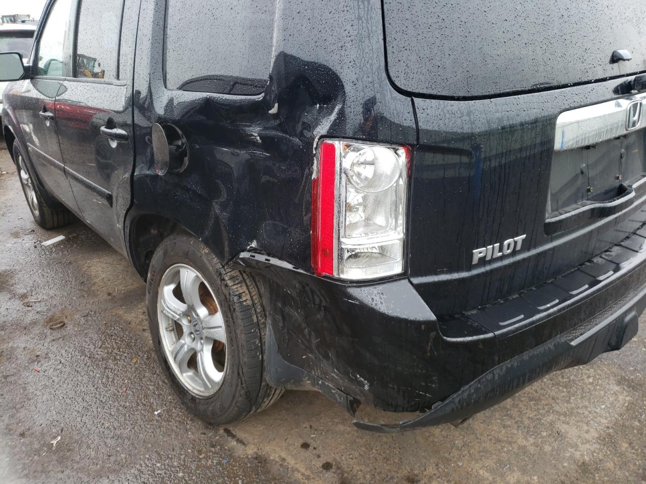Photo 9 from auction – 2014 HONDA PILOT EXLN with VIN 5FNYF4H78EB043729
