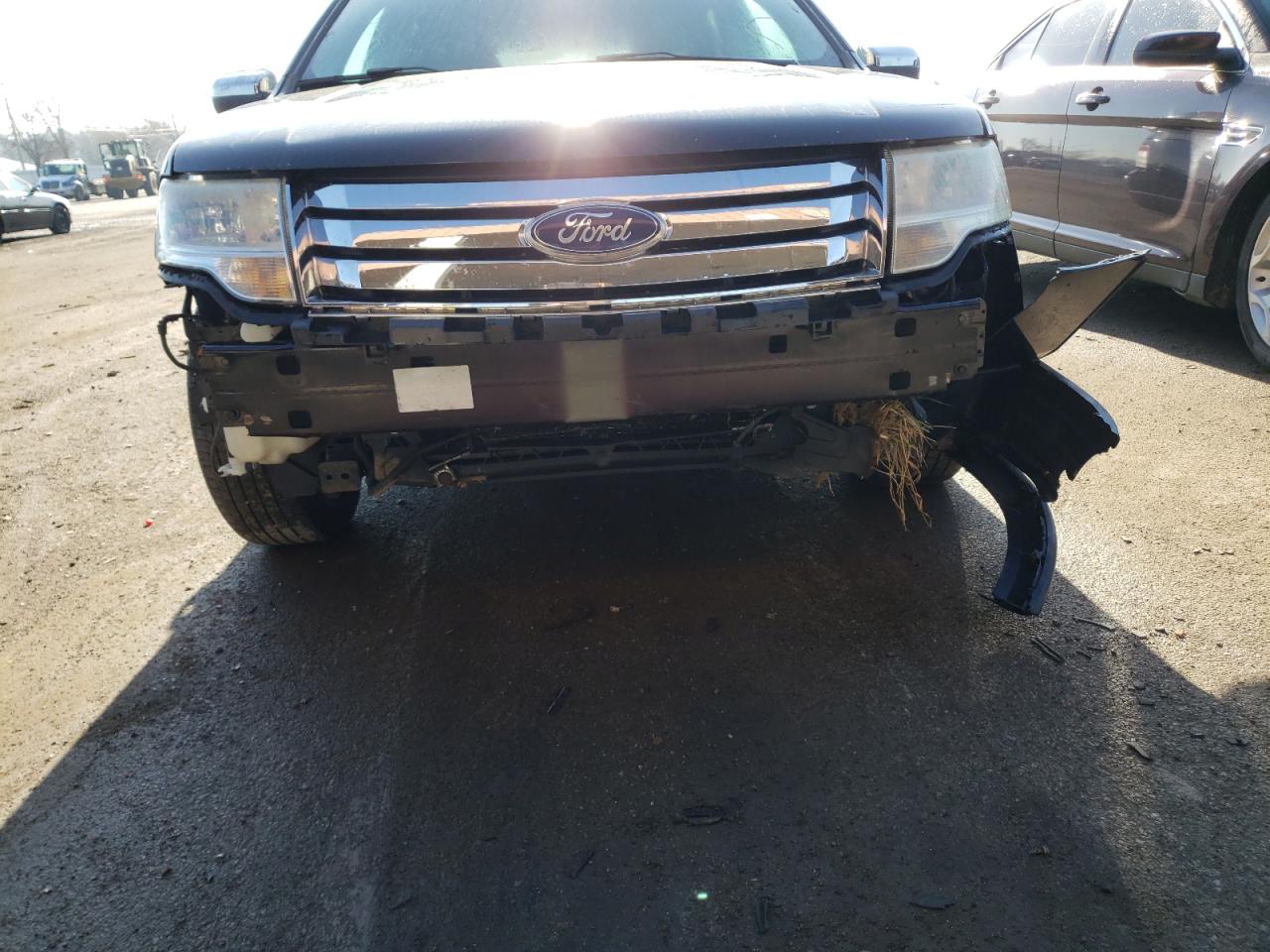 Photo 9 from auction – 2008 FORD TAURUS X L with VIN 1FMDK03W08GA23112